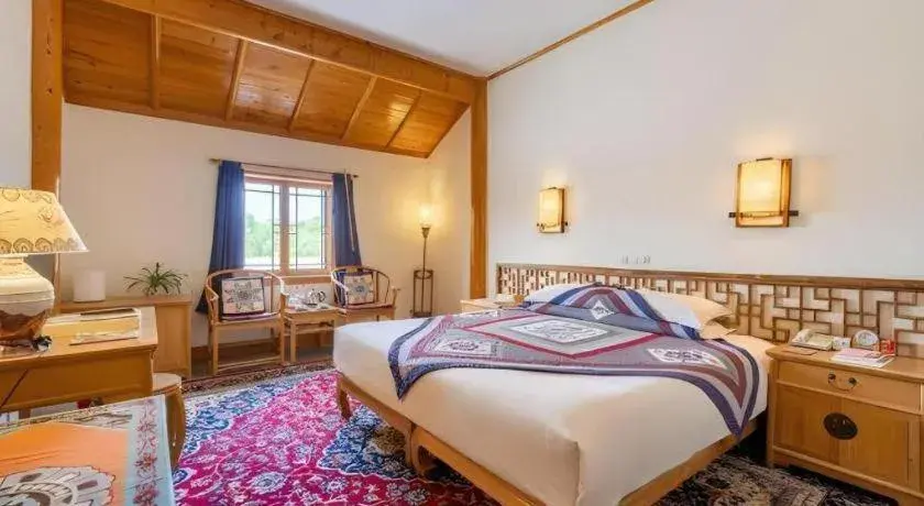 Bed in The Silk Road Dunhuang Hotel Bed in The Silk Road Dunhuang Hotel