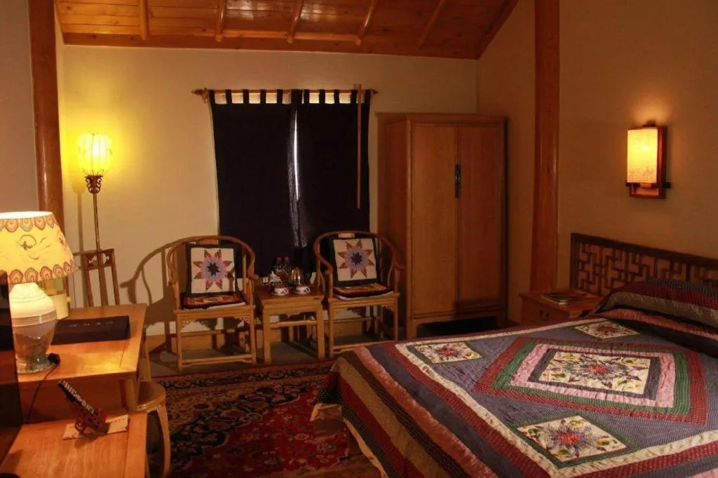 Bed in The Silk Road Dunhuang Hotel