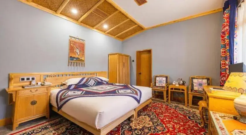 Bed in The Silk Road Dunhuang Hotel Bed in The Silk Road Dunhuang Hotel