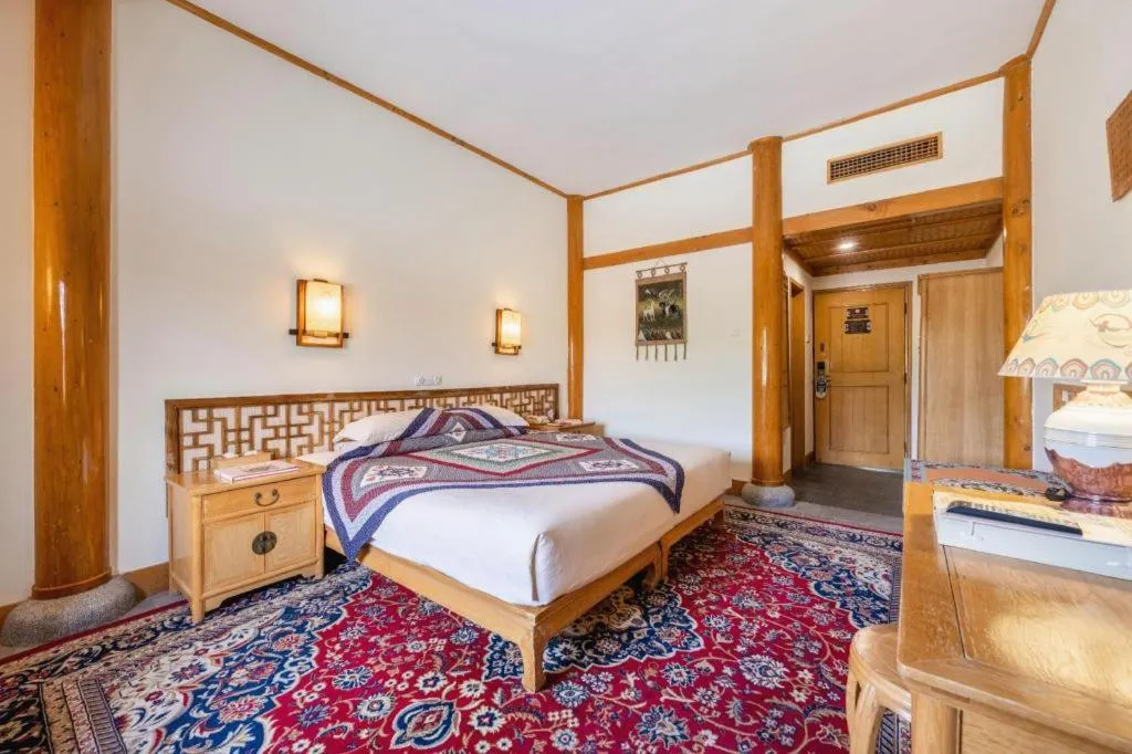 Bed in The Silk Road Dunhuang Hotel