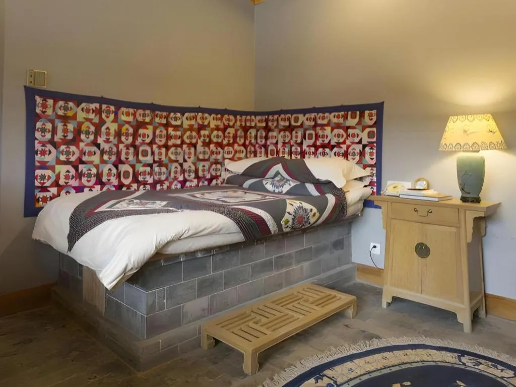 Bed in The Silk Road Dunhuang Hotel