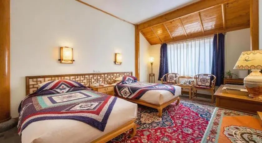 Bed in The Silk Road Dunhuang Hotel Bed in The Silk Road Dunhuang Hotel