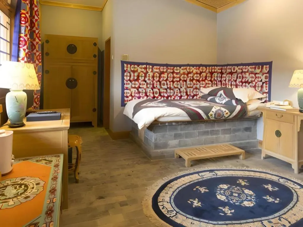 Bed in The Silk Road Dunhuang Hotel