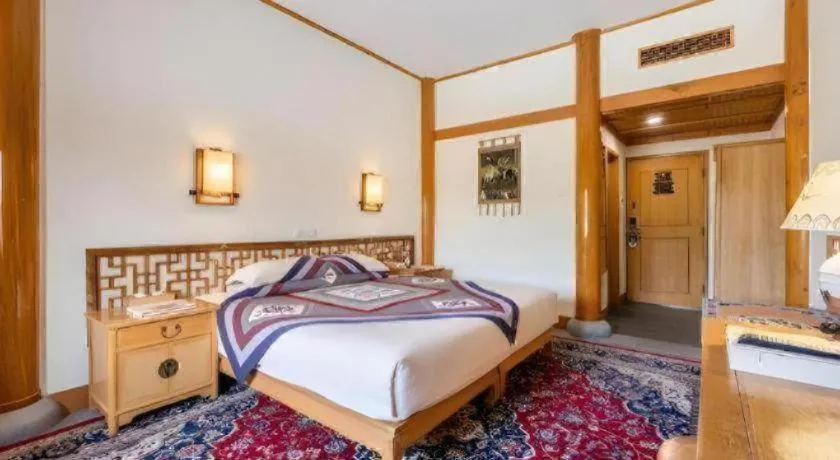 Bed in The Silk Road Dunhuang Hotel