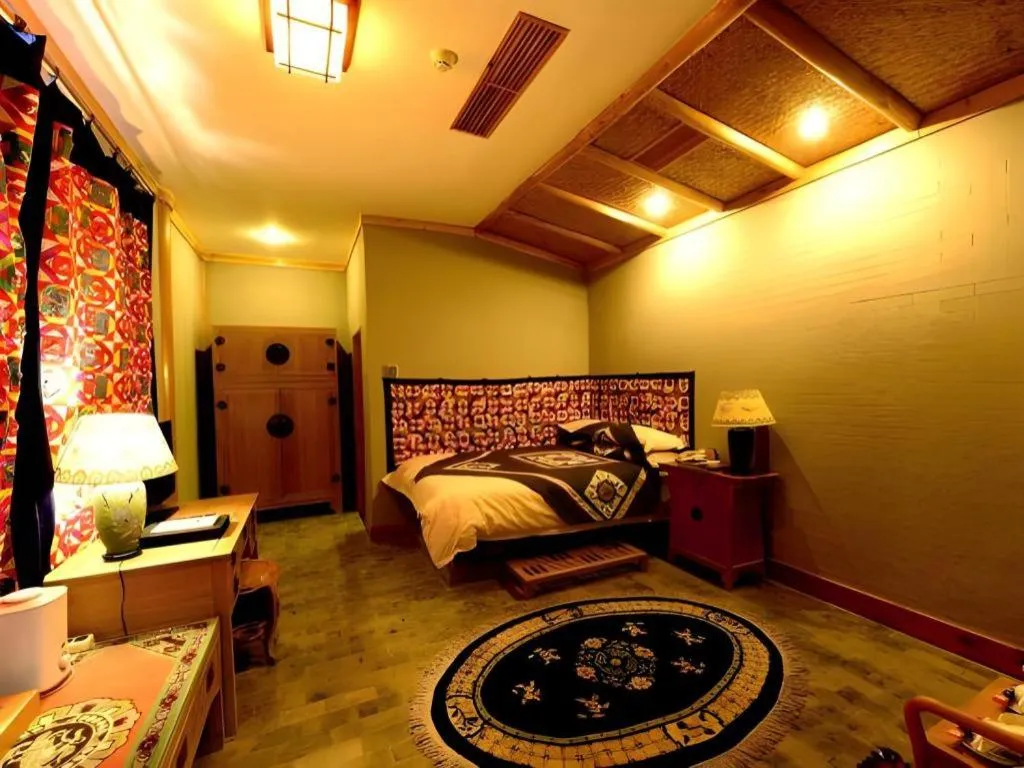 Bed in The Silk Road Dunhuang Hotel
