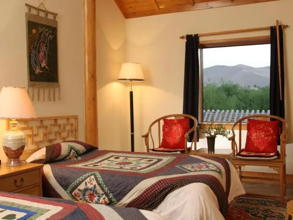 Bed in The Silk Road Dunhuang Hotel Bed in The Silk Road Dunhuang Hotel