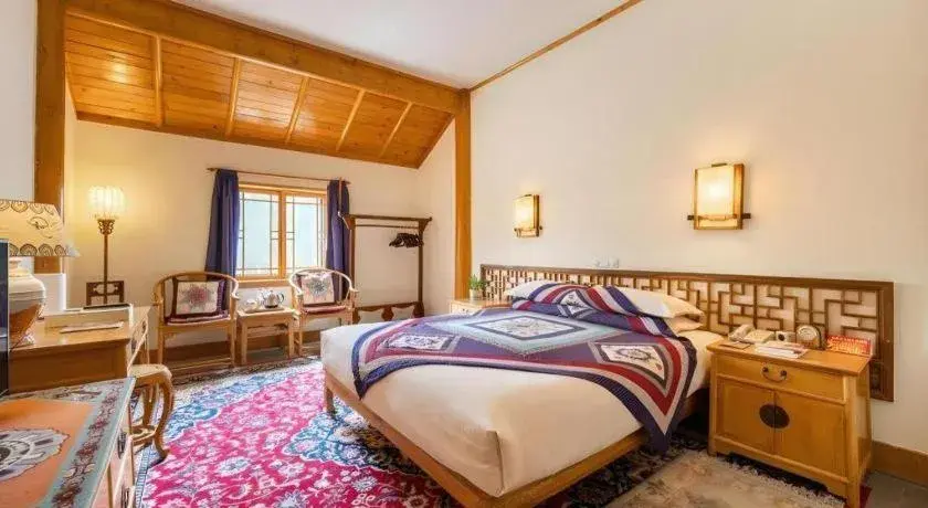 Bed in The Silk Road Dunhuang Hotel Bed in The Silk Road Dunhuang Hotel