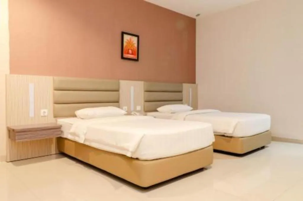 Bed in Lovina Inn Hotel Batam