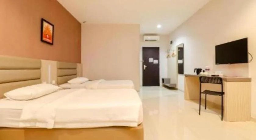 Bed in Lovina Inn Hotel Batam