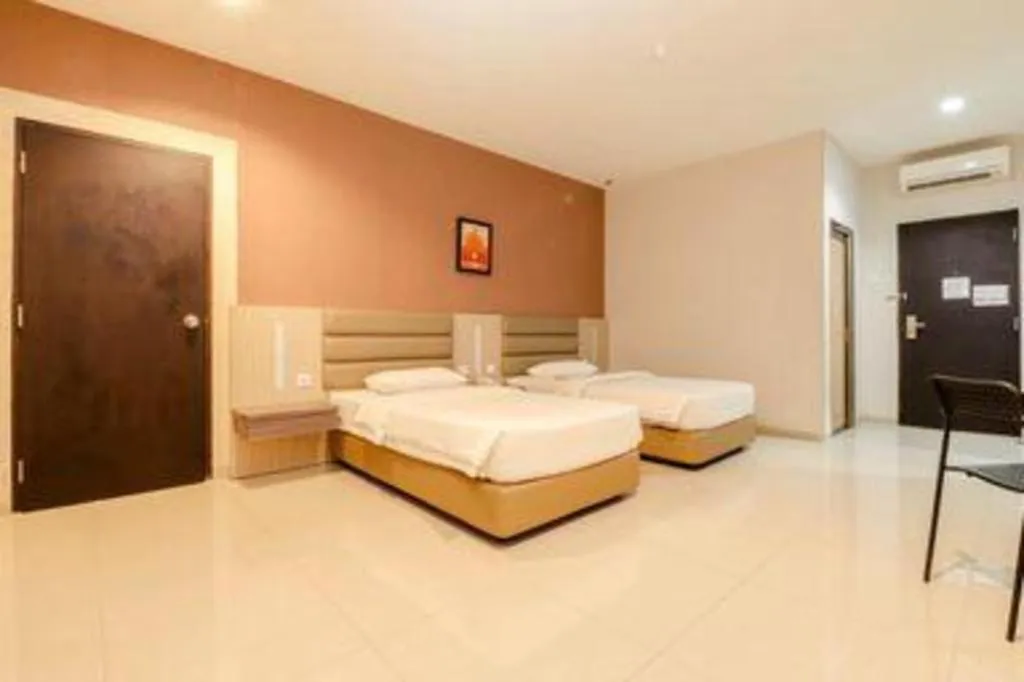 Bed in Lovina Inn Hotel Batam