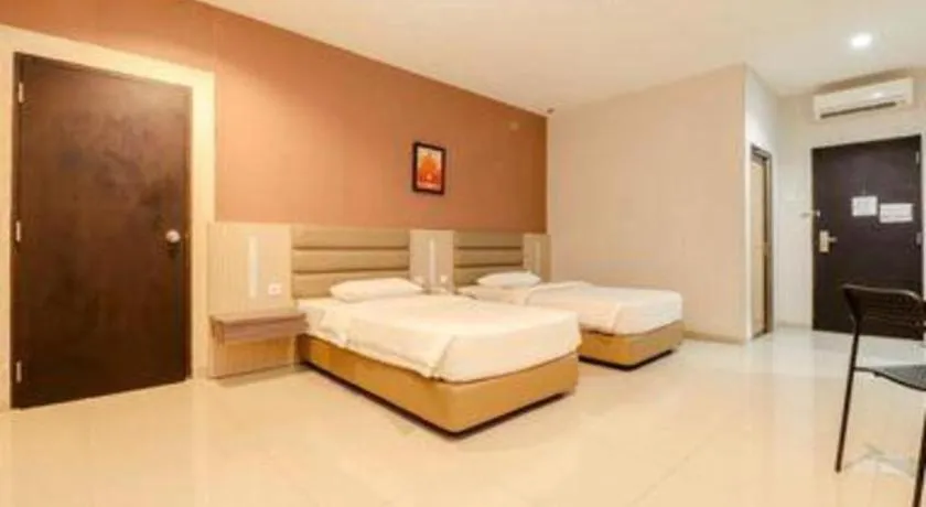 Bed in Lovina Inn Hotel Batam