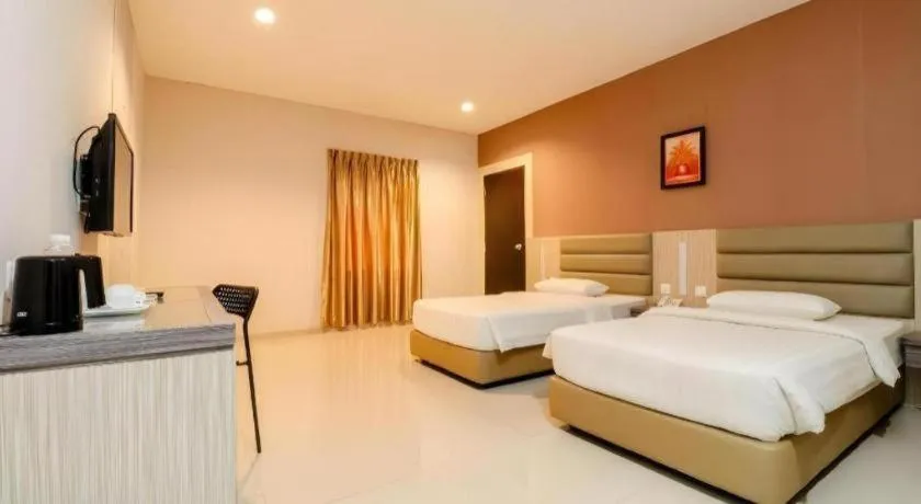 Bed in Lovina Inn Hotel Batam