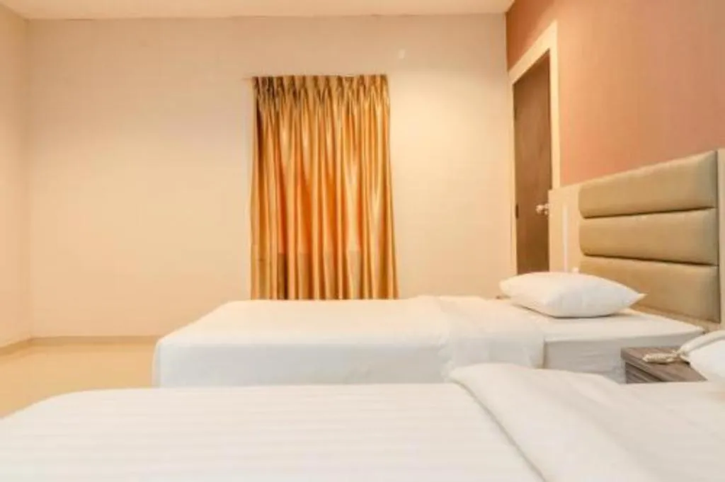Bed in Lovina Inn Hotel Batam