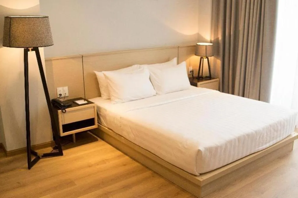 Bed in Lavender Boutique Hotel