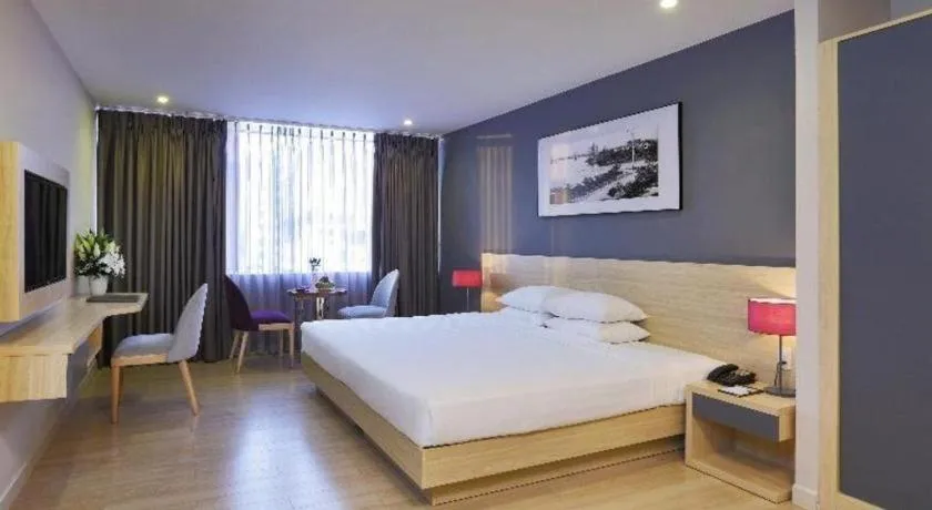 Bed in Lavender Boutique Hotel