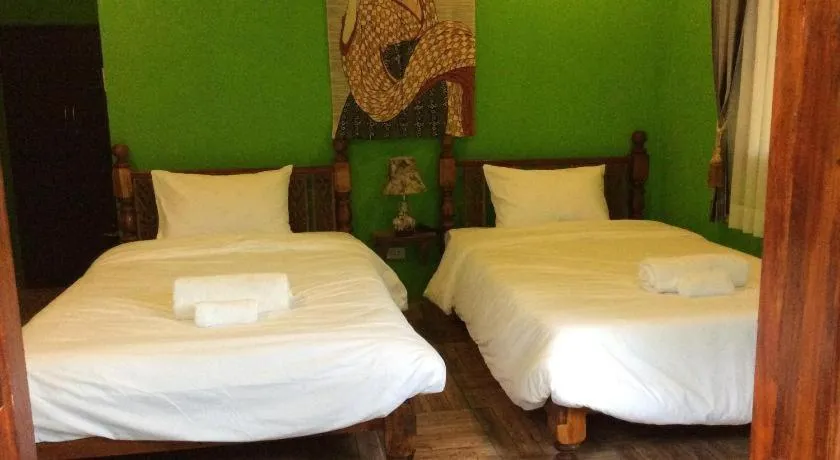 Bed in Himawari Restaurant and Cottage