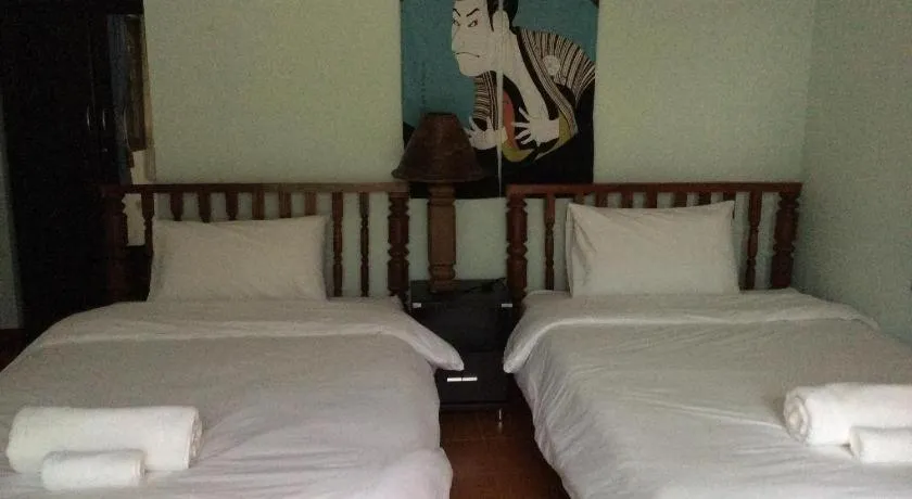 Bed in Himawari Restaurant and Cottage