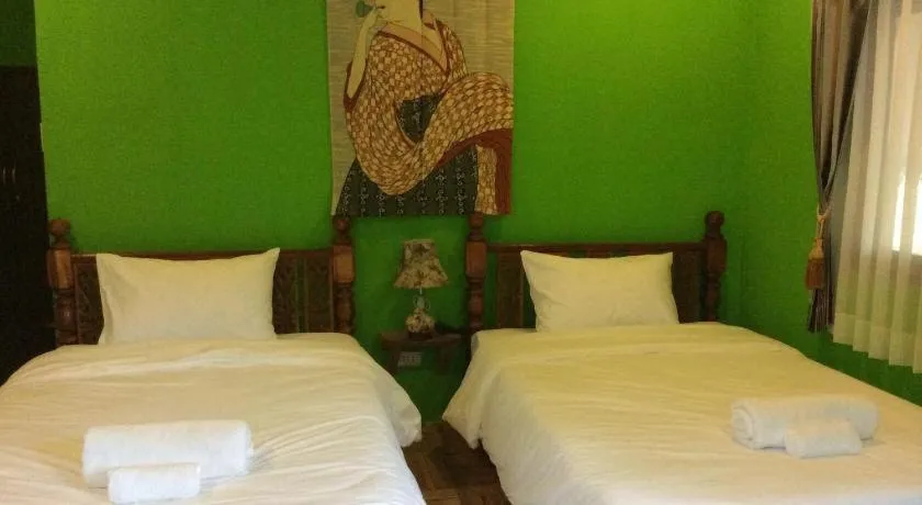 Bed in Himawari Restaurant and Cottage