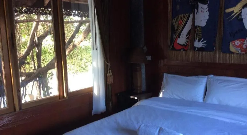 Bed in Himawari Restaurant and Cottage