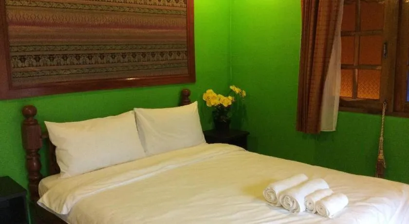 Bed in Himawari Restaurant and Cottage