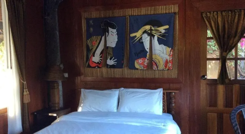 Bed in Himawari Restaurant and Cottage