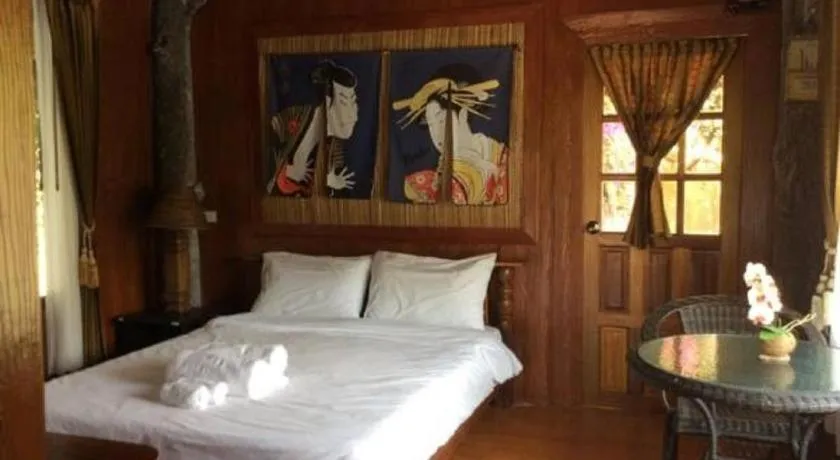 Bed in Himawari Restaurant and Cottage
