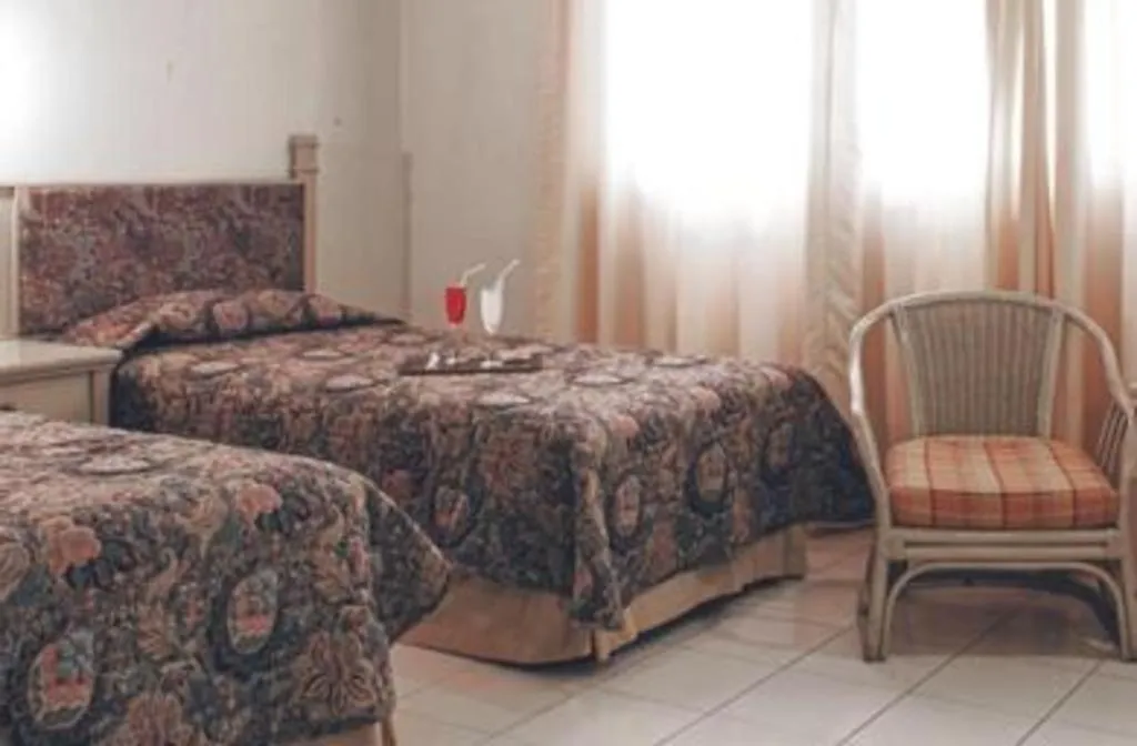 Bed in Hotel Griyadi Kusuma Sahid