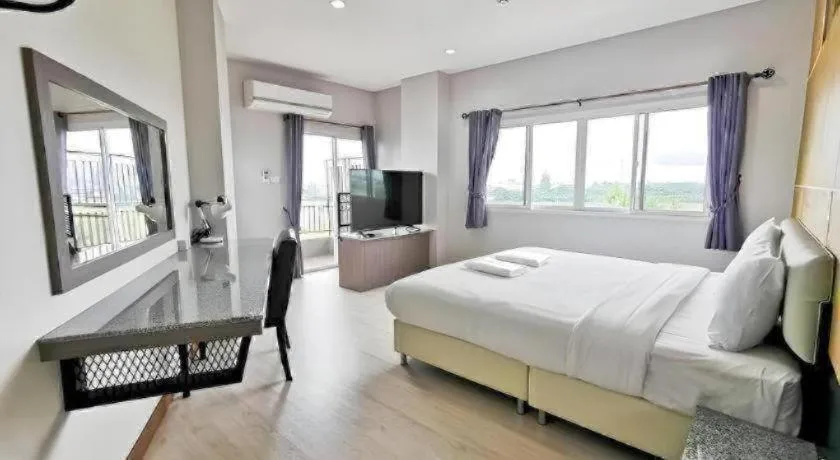 Bed in The Y Residence