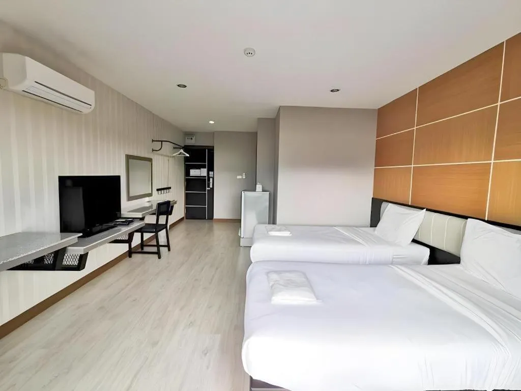 Bed in The Y Residence