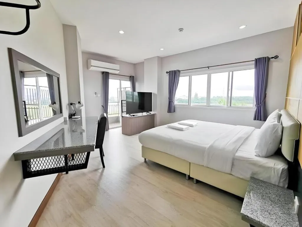 Bed in The Y Residence