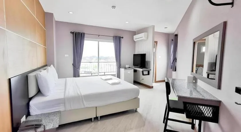 Bed in The Y Residence