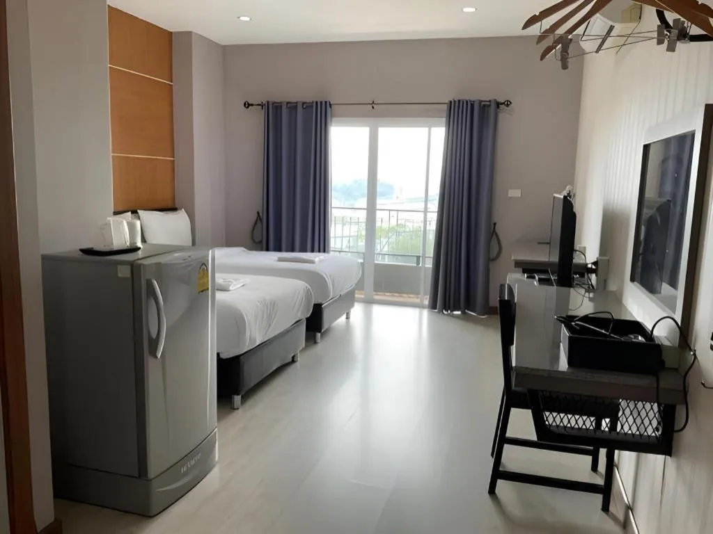 Bed in The Y Residence