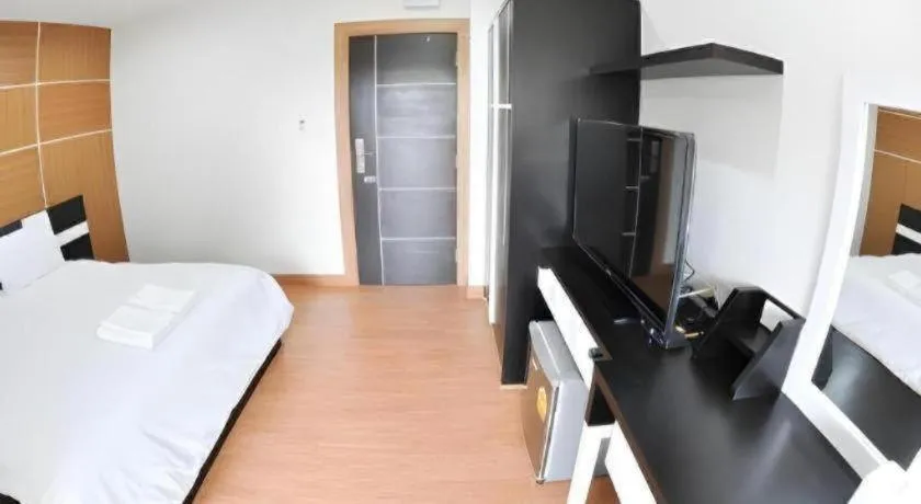 Bed in The Y Residence