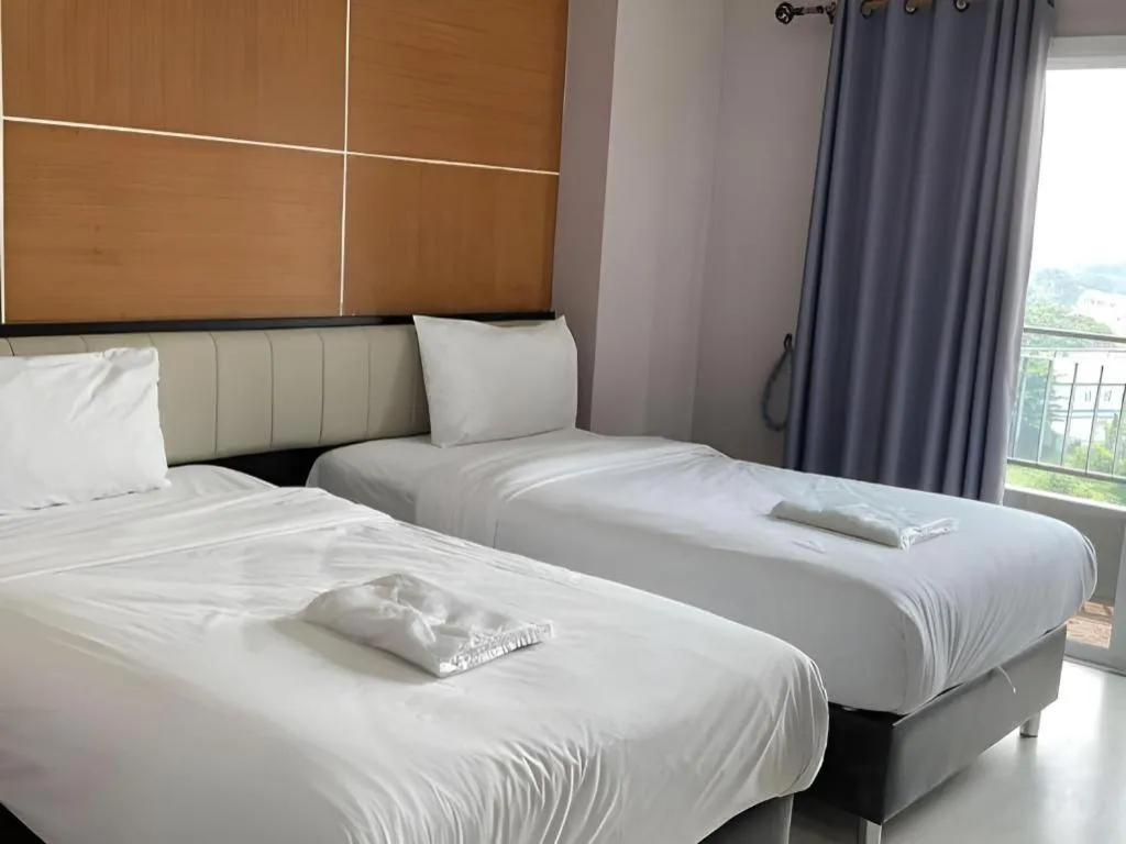 Bed in The Y Residence