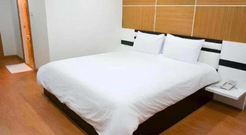 Bed in The Y Residence