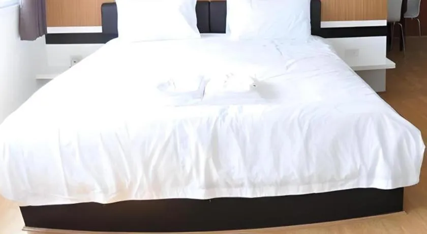 Bed in The Y Residence