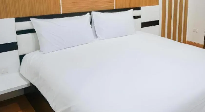 Bed in The Y Residence