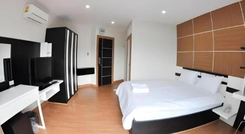 Bed in The Y Residence