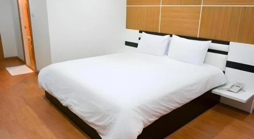 Bed in The Y Residence