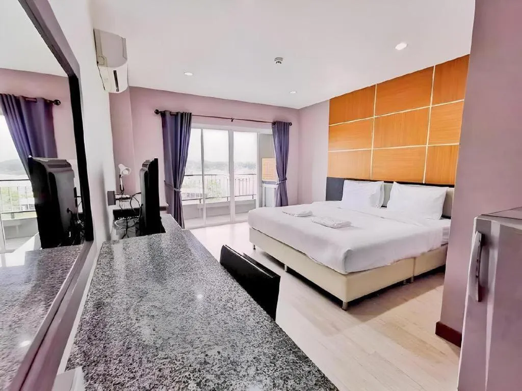 Bed in The Y Residence