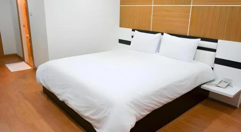 Bed in The Y Residence