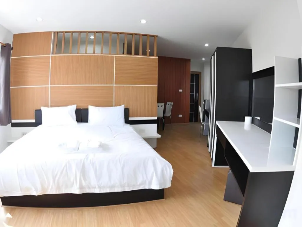 Bed in The Y Residence