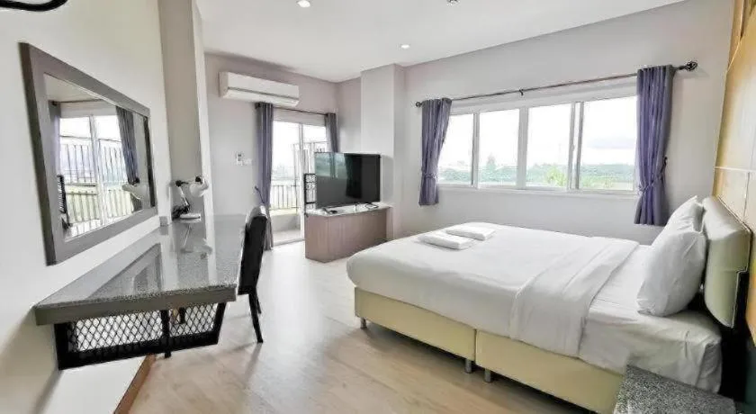 Bed in The Y Residence