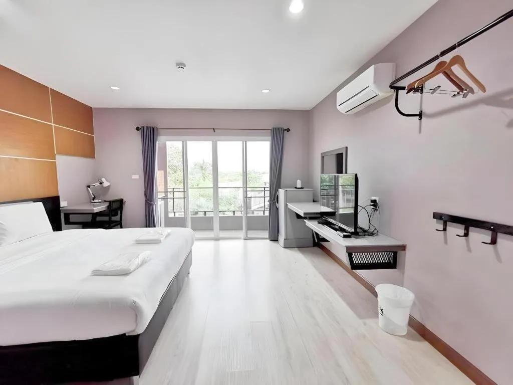 Bed in The Y Residence