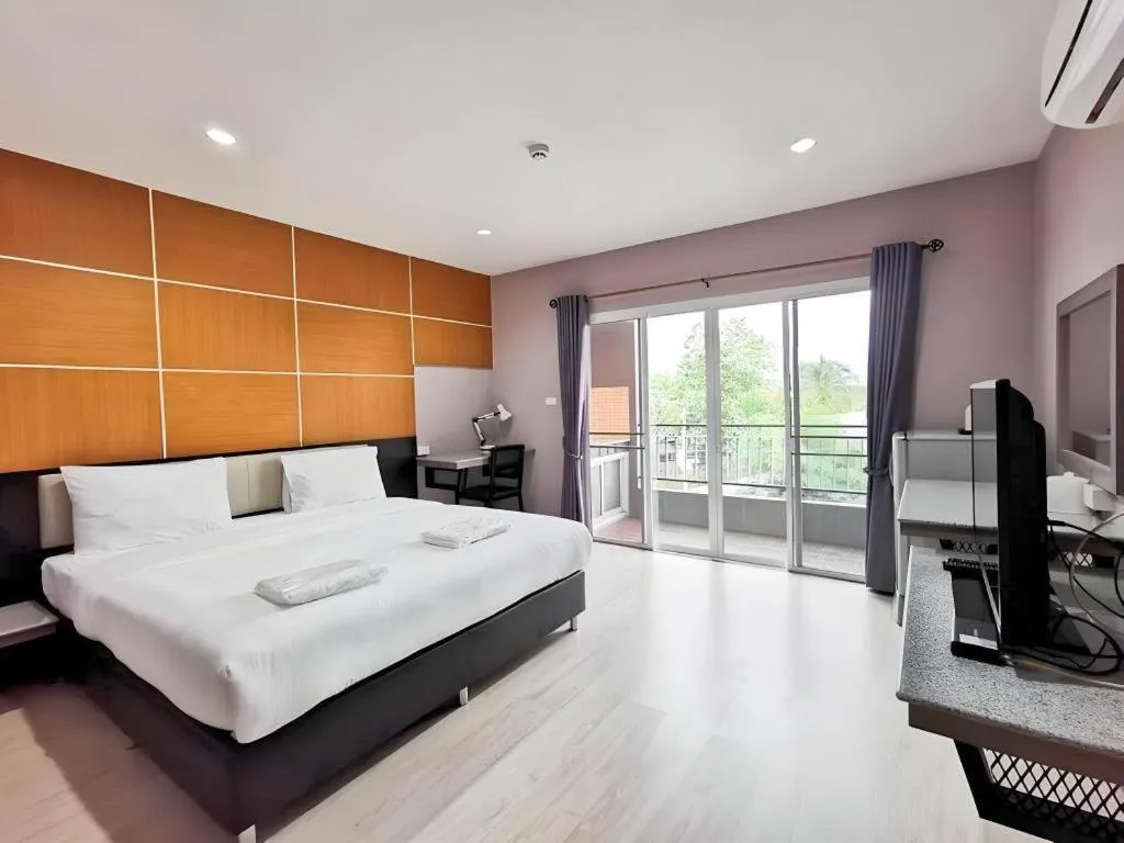 Bed in The Y Residence