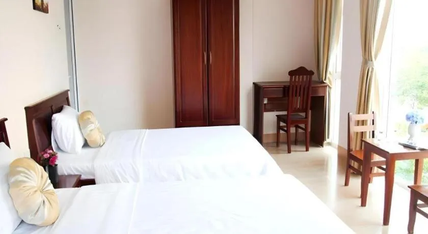 Bed in Huong Binh Hotel