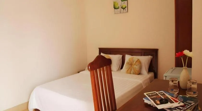 Bed in Huong Binh Hotel