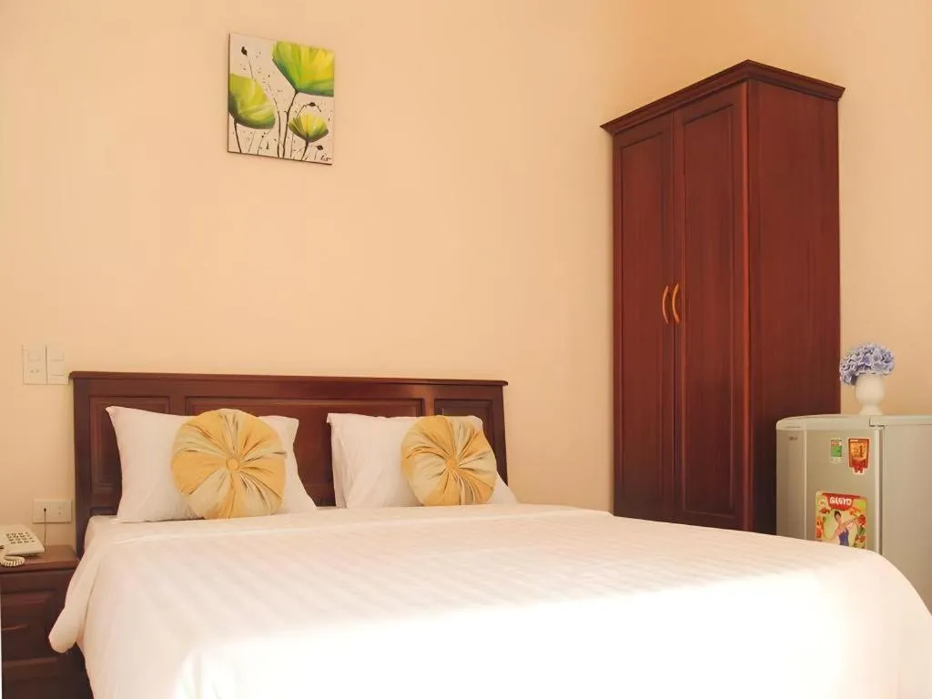Bed in Huong Binh Hotel