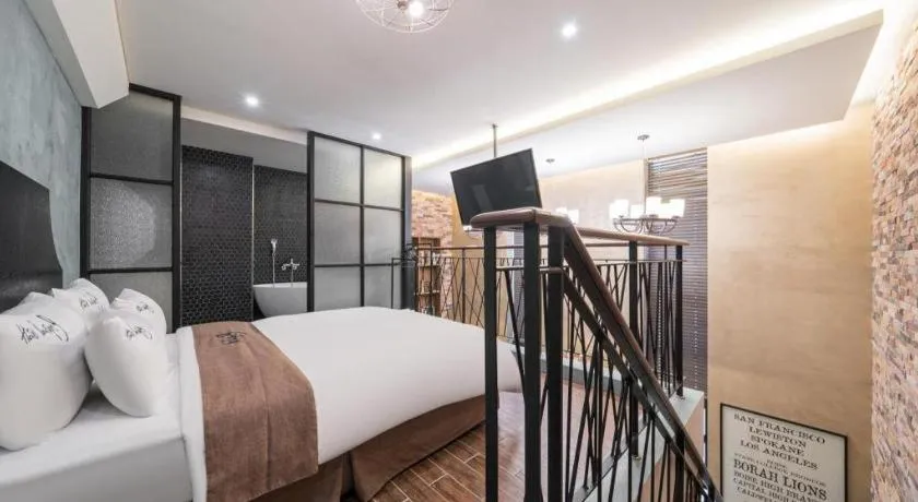 Bed in Hotel Boutique 9