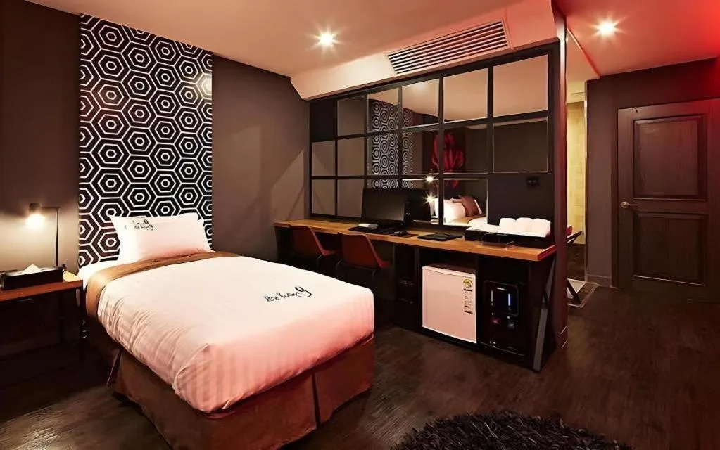 Bed in Hotel Boutique 9